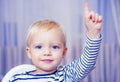 I have excellent idea. Boy cute toddler blue eyes pointing upwards index finger. Creative idea concept. Brilliant