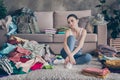 I have nothing wear need buy more clothes. Full body photo of frustrated disappointed girl sit floor carpet look Royalty Free Stock Photo