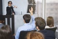I have question. Listener raising hand during seminar Royalty Free Stock Photo