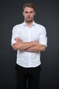 I am here to help you. Man shop consultant looks confident and hospitable. Man calm face posing confidently with folded Royalty Free Stock Photo