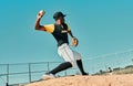 I hope youre ready for this one. a young baseball player pitching the ball during a game outdoors. Royalty Free Stock Photo