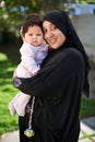 I just adore her. a muslim mother and her little baby girl.