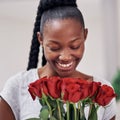 I know just who sent me these. a beautiful young woman holding a bunch or roses.