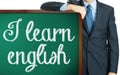 I learn english on blackboard presenting by businessman or teach Royalty Free Stock Photo