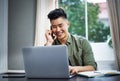 I like the look of your design brief. a handsome young man taking a call while working at home.