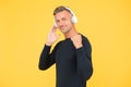 I really like sounding. quality wireless device. cheerful man wearing earphones. music and digital technology. ebook and