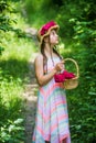 I like taking care of the flowers. small kid with flowers. love and beauty. stunning girl with bouquet flowers of roses Royalty Free Stock Photo