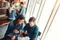 I like you beery much. a young couple having drinks in a bar with people blurred in the background. Royalty Free Stock Photo