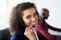 I live to help others. Cropped portrait of an attractive young female call center agent working in her office. Royalty Free Stock Photo