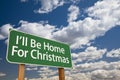 I'll Be Home For Christmas Green Road Sign Over Sky Royalty Free Stock Photo