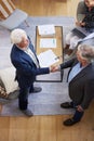 I look forward to doing more business with you. Aerial shot of two senior businessmen shaking hands.