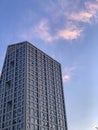 A tall office building under the purple sky Royalty Free Stock Photo