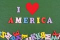 I love America word on green background composed from colorful abc alphabet block wooden letters, copy space for ad text Royalty Free Stock Photo