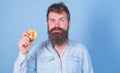 I love apples Man handsome hipster with long beard eating apple. Hipster hungry bites enjoy ripe apple. Man diet