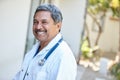 I love being a doctor. Cropped portrait of a male doctor smiling happily outside. Royalty Free Stock Photo