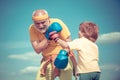 I love boxing. Funny cute child fighting. Grandpa and little child boy in boxing stance doing exercises with boxing Royalty Free Stock Photo