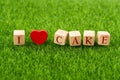 I love cake in wooden cube