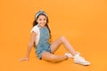I love changing my style. Adorable small girl relax in fashion style. Little cute child with long brunette hair style on Royalty Free Stock Photo