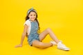 I love changing my style. Adorable small girl relax in fashion style. Little cute child with long brunette hair style on Royalty Free Stock Photo