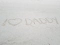 I love Daddy written in sand at the beach Royalty Free Stock Photo