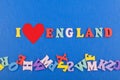 I love ENGLAND word on blue background composed from colorful abc alphabet block wooden letters, copy space for ad text