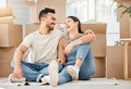 I love every moment and milestone with you. a young couple sitting on the floor while moving house. Royalty Free Stock Photo