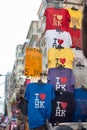 `I love HK` t-shirts hanging at a souvenir stall at the Ladies Market in the Mong Kok area of Kowloon, Hong Kong
