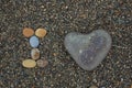 I love made from stones on sandy beach. Royalty Free Stock Photo