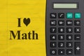 I love math message on yellow ruled notebook crumpled paper with a calculator