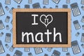 I love math word message on a chalkboard with calculators Royalty Free Stock Photo