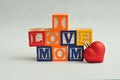 I love mom spelled with colorful alphabet blocks Royalty Free Stock Photo