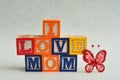 I love mom spelled with colorful alphabet blocks Royalty Free Stock Photo