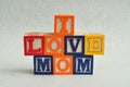 I love mom spelled with colorful alphabet blocks Royalty Free Stock Photo