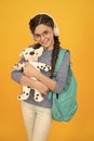 I love my friend. Happy child cuddle soft dog. Little girl smile with toy friend. Friend and friendship. Playing games Royalty Free Stock Photo