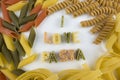 I love pasta text on white plate with colourful pasta letters Royalty Free Stock Photo