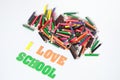 I love school ,School supplies colored pencils in Fall scattered, isolated Royalty Free Stock Photo