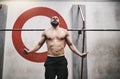 I love starting with this workout. a young man skipping rope in a gym. Royalty Free Stock Photo