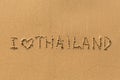 I love Thailand - the inscription by hand on the beach sand. Travel. Royalty Free Stock Photo