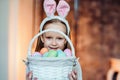 I love to celebrate Easter.Cute girl holding basket with easter eggs and smiling.Celebration concept Royalty Free Stock Photo