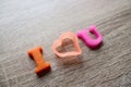 `i love u` word Close-up shot selective focus colorful, magnetic letters with romantic question for Valentine`s Day Royalty Free Stock Photo