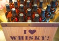 I love whisky sign and whisky bottles