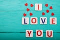 I love you on blue wooden background. Top view. Mock up. Copy space. Mother valentine day. Royalty Free Stock Photo