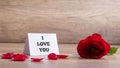 I Love You Card with Red Rose on the Table Royalty Free Stock Photo