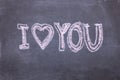 I love you. Chalk lettering on blackboard. Multi colored inscription Royalty Free Stock Photo