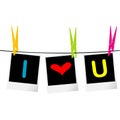 I love you concept with photo frames hanging on rope and colored