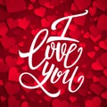 I love you handwritten brush pen lettering on red hearts background, Valentine's Day Royalty Free Stock Photo