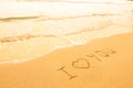 I love you - inscription on the beach sand Royalty Free Stock Photo