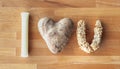 An I love you message spelled out using food items including a mozzarella string cheese stick, heart shaped potato and granola bar Royalty Free Stock Photo