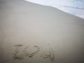 I love you message written on the sea shore. Royalty Free Stock Photo