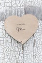 I love you mum written on a heart-shaped card by a girl Royalty Free Stock Photo